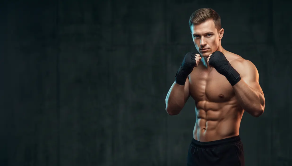 Attractive athletic man in boxing style representing protein intake for men calculator
